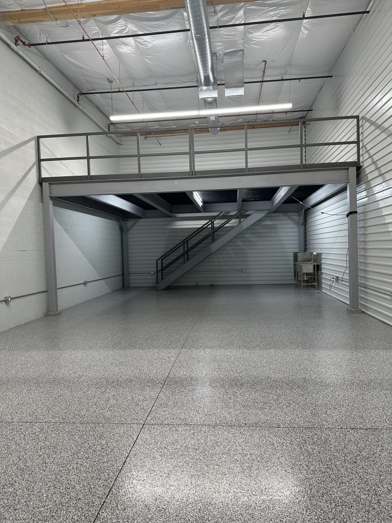 A garage suite with epoxy floors at Motor Vault in Arizona