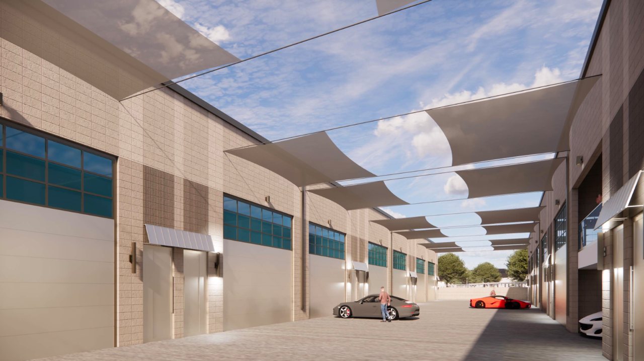 Private garage suites and car condos along a shaded drive aisle in Scottsdale, conceptual rendering