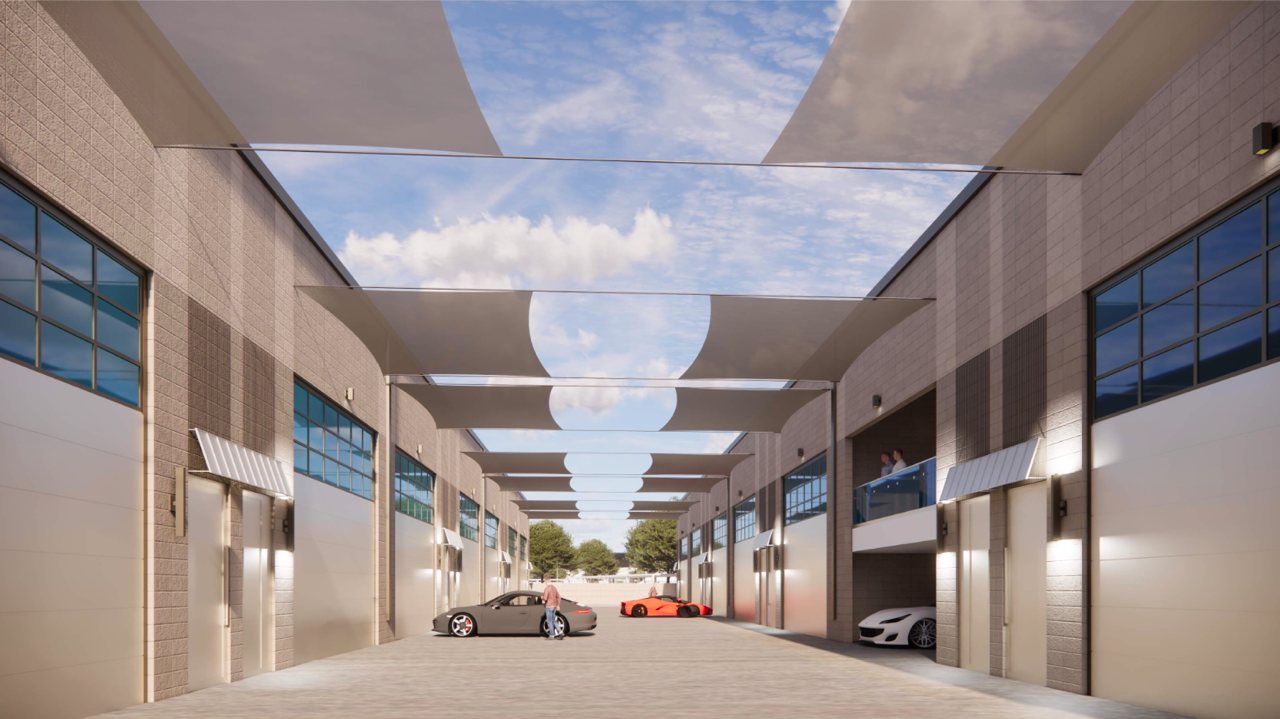 Garage suite drive aisle with shade canopies at Motor-Vault Shea and 101, conceptual rendering